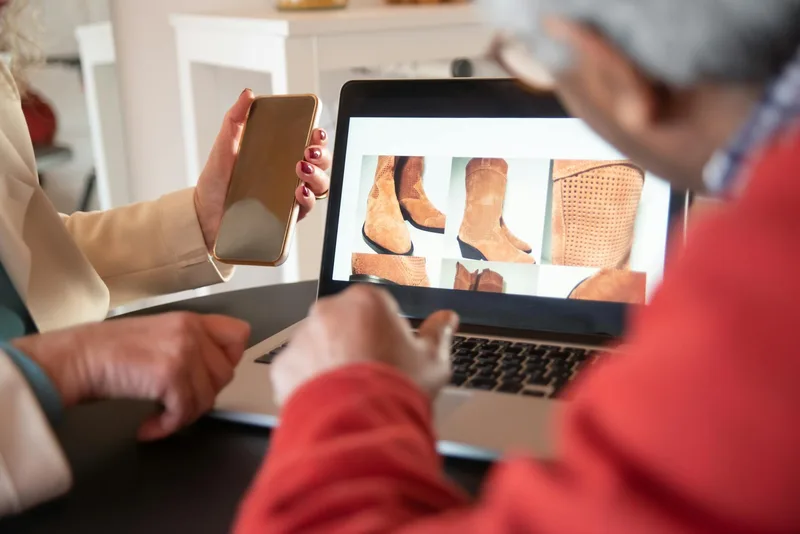 Ecommerce seller managing product listings on a laptop with UAE marketplace interface visible