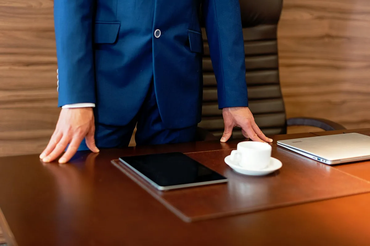 UAE ecommerce seller reviewing VAT documents on a laptop at a professional desk