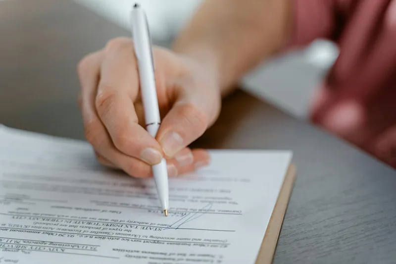Business registration documents being reviewed at a desk